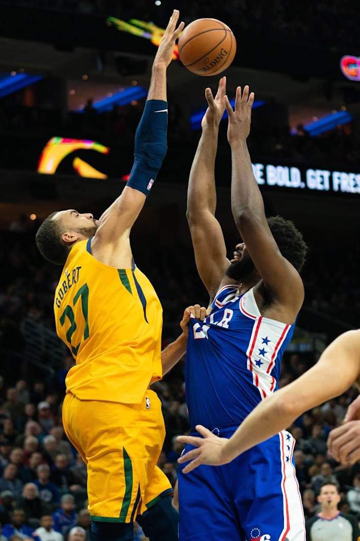 Rudy Gobert (27) blocks Joel Embiid (21)